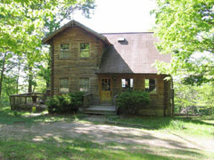 The Retreat Cabin has central airconditioning and forced air heating, as well as a fireplace for additional heat.
